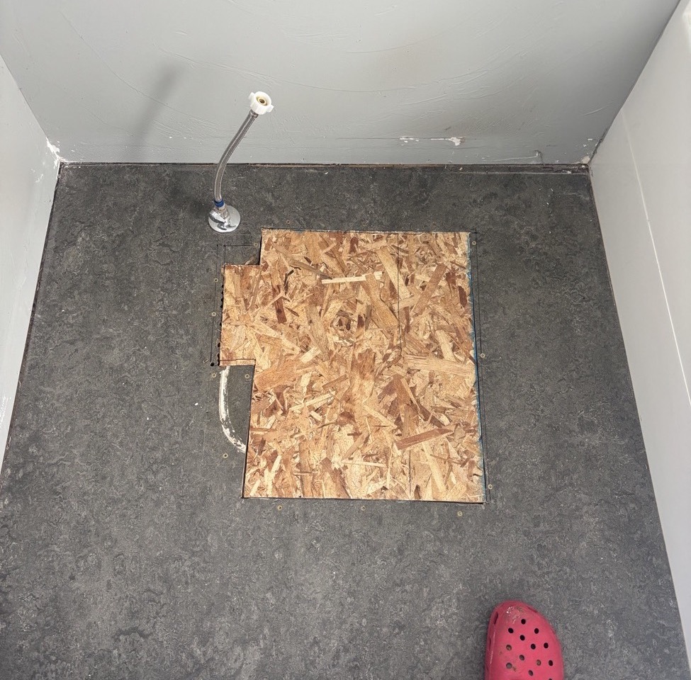 New subfloor patched into the bathroom floor